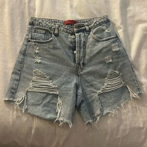 High waisted mid thigh distressed denim shorts